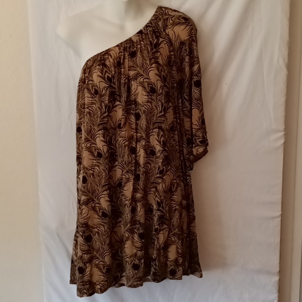 Super versatile short flowy dress or top.